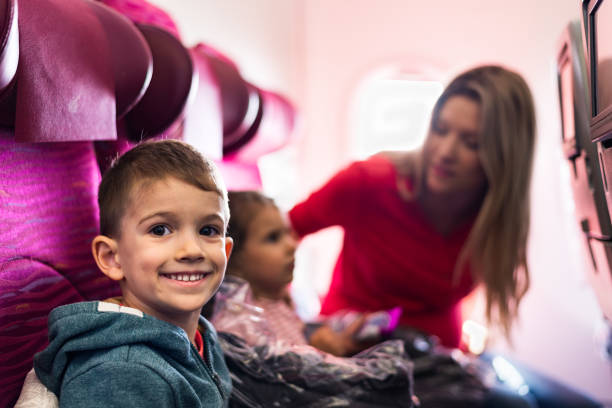 istock Family traveling by plane 1303833980