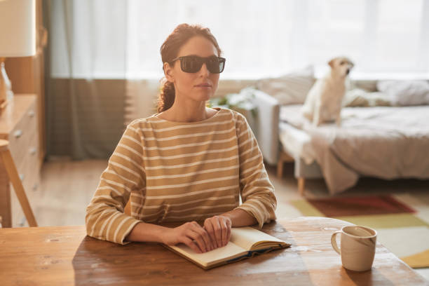Blind Woman Reading Book at Home