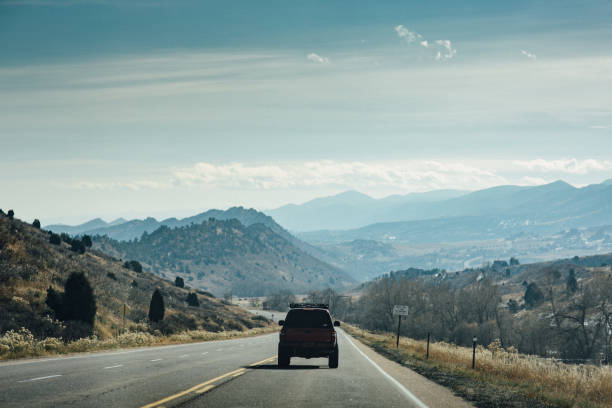 istock Driving on Highway to Mountain 1303836660