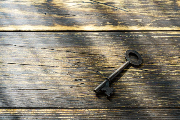 Vintage key on wooden table