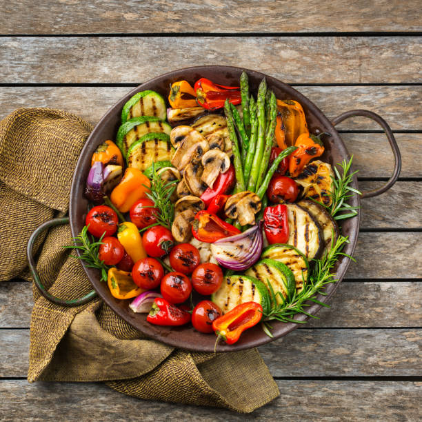 istock Grilled vegetables in a pan. Summer vegan plating, charcuterie 1303839647