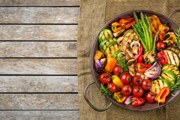 istock Grilled vegetables in a pan. Summer vegan plating, charcuterie 1303839648