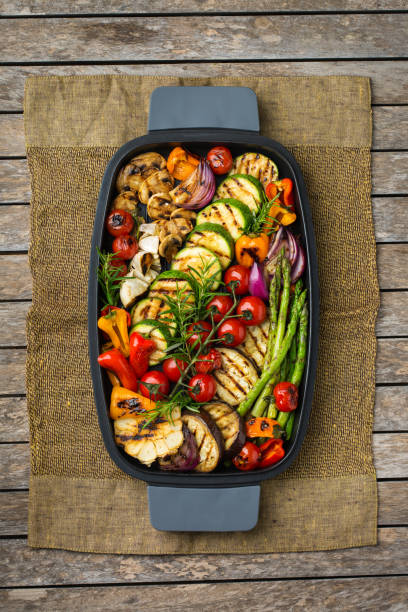 istock Grilled vegetables in a pan. Summer vegan plating, charcuterie 1303839671