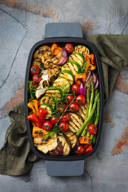 Grilled vegetables in a pan. Summer vegan plating, charcuterie