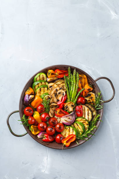 istock Grilled vegetables in a pan. Summer vegan plating, charcuterie 1303839720