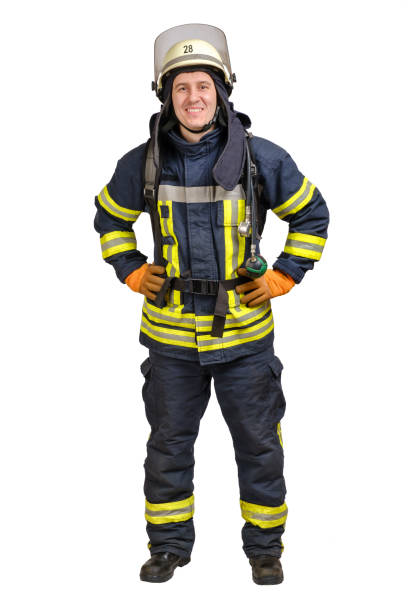 istock Smiling young man in uniform of firefighter 1303839747