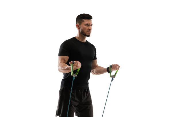 istock Caucasian professional sportsman training isolated on white studio background. Muscular, sportive man practicing. 1303841273