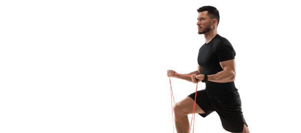 istock Caucasian professional sportsman training isolated on white studio background. Muscular, sportive man practicing. 1303841275