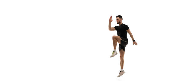 istock Caucasian professional sportsman training isolated on white studio background. Muscular, sportive man practicing. 1303841300