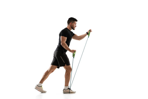 istock Caucasian professional sportsman training isolated on white studio background. Muscular, sportive man practicing. 1303841313