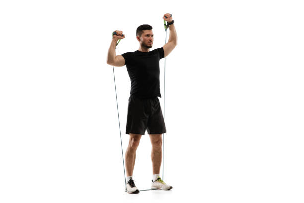 istock Caucasian professional sportsman training isolated on white studio background. Muscular, sportive man practicing. 1303841315