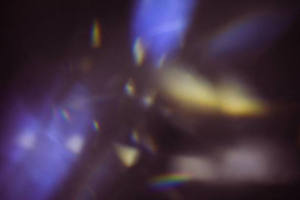 istock colorful warm rainbow light leaks on black background with dust texture 1303841492