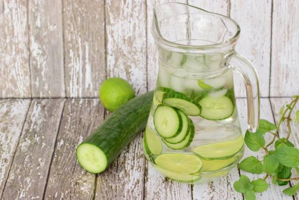 istock Cucumber lime mint infused water in pitcher 1303842987