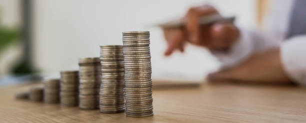 istock Place the coins in a line from low to high. 1303843829