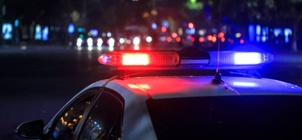 istock Police lights at night 1303851351