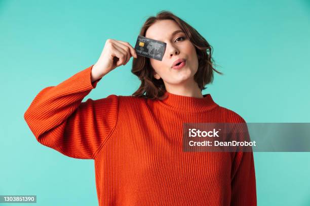 Portrait Of A Pretty Young Woman Dressed In Sweater Stock Photo - Download Image Now