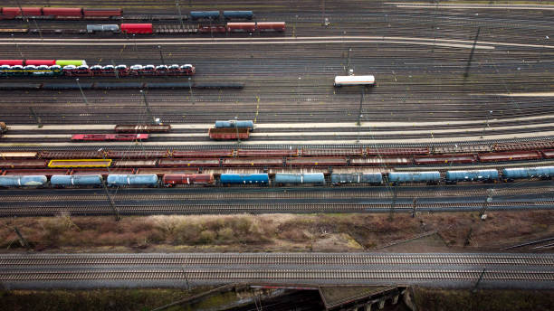 istock Railyard, shunting yard and freight trains - aerial view 1303851584