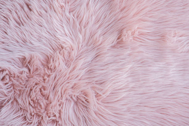 istock Pink fur background. Minimal Valentines or Mother's day concept. 1303852401