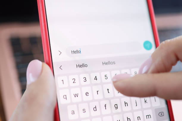 istock An SMS with the word hello is pressed on smartphone screen 1303855092