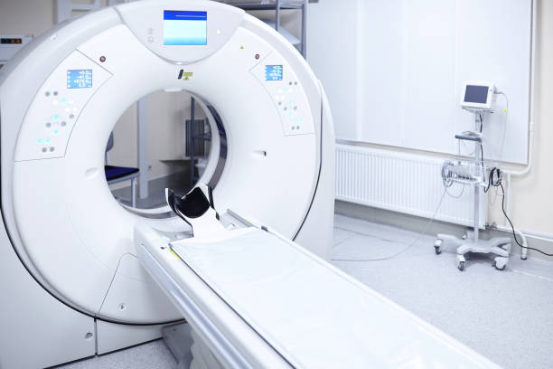istock CT (Computed tomography) scanner in hospital laboratory. 1303855772