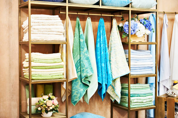 istock Colored terry towels on a shelf 1303856259