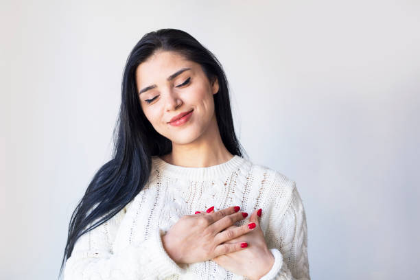 istock Self love, self acceptance, happiness concept. Woman hugging herself 1303857100