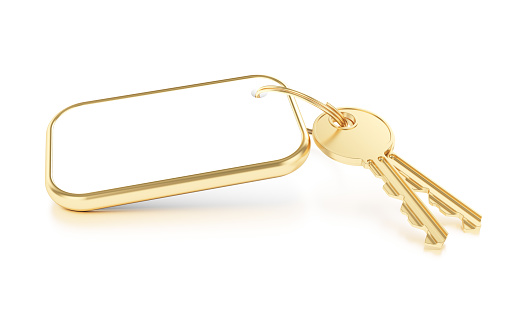 Golden keys with label isolated on white background