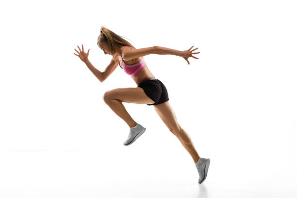 istock Caucasian professional female runner, athlete training isolated on white studio background. Copyspace for ad. 1303857465
