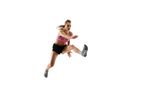 istock Caucasian professional female runner, athlete training isolated on white studio background. Copyspace for ad. 1303857531