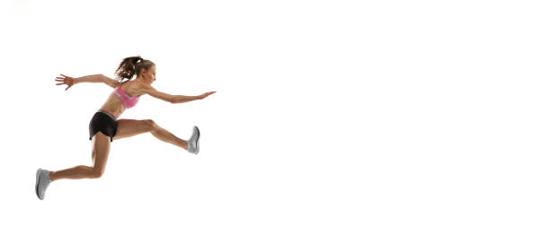 istock Caucasian professional female runner, athlete training isolated on white studio background. Copyspace for ad. 1303857555