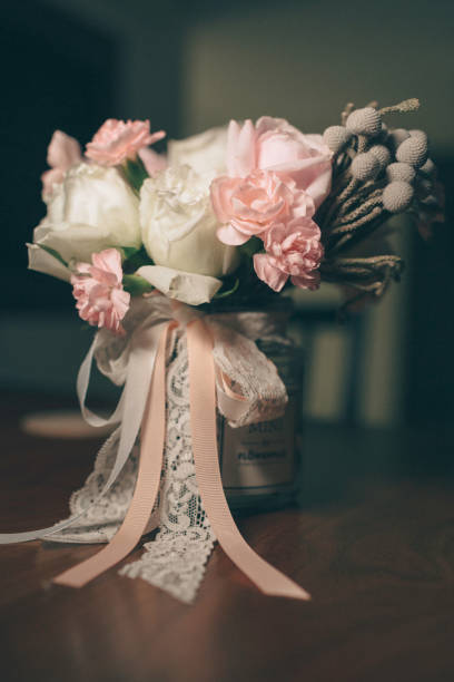 istock Pretty mason jar flower arrangements 1303860394