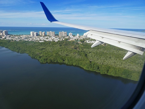 Beautiful aerial view of the tip of San Juan District, seen from an airplane window.