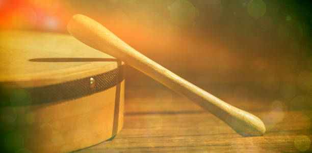 istock Cropped image of wooden bodhran with stick 1303862619