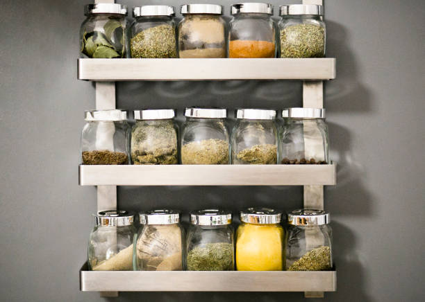 istock Spices in jars on shelves 1303866885