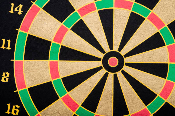istock dartboard closeup view showing target success concept 1303867836