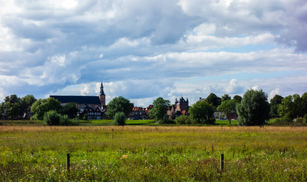 istock Scenery with church and castle in Hattem, Netherlands 1303870507