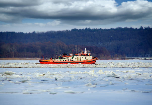 istock Icebreaker in operation breaking ice floes on the river 1303874309
