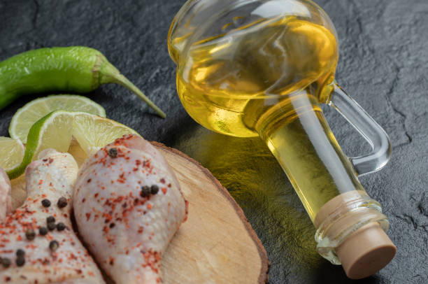 istock Marinated chicken legs with lime and oil 1303879942