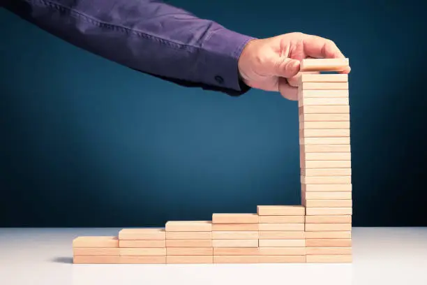 Photo of Arranged Wood Blocks as Compound Interest