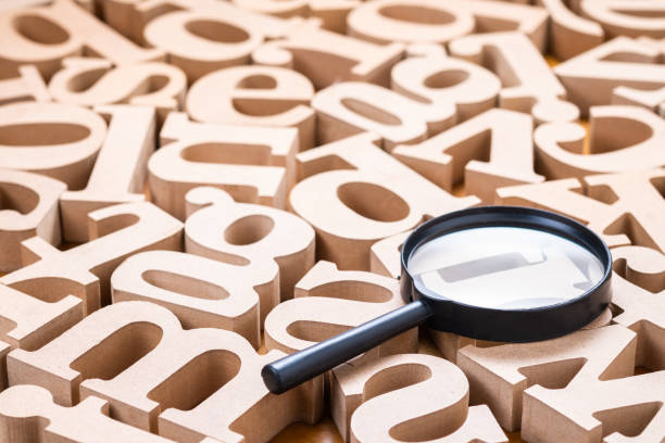 Magnifying glass on Wood Alphabets