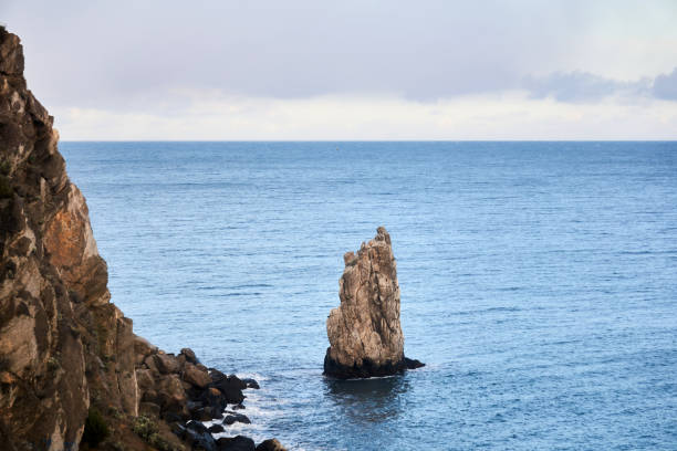 istock seascape with sheer coastal cliffs 1303882579