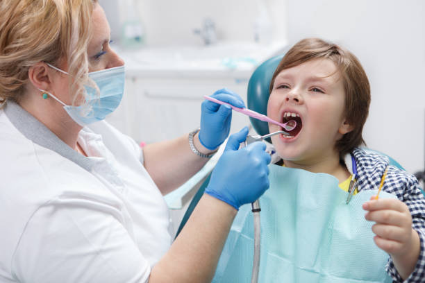istock Young boy at dental clinic 1303882894