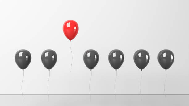 istock Standing out from the crowd and different concept, red and black balloon on white background 1303882988