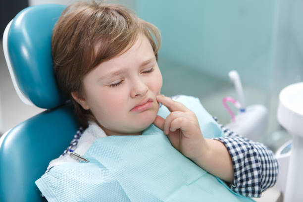 istock Young boy at dental clinic 1303883073