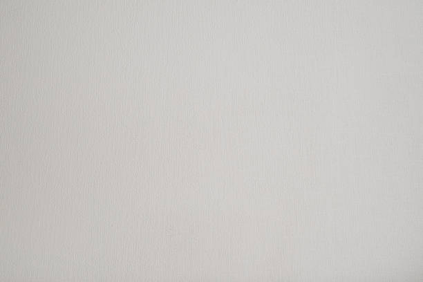 istock White watercolor scratched textured paper background 1303884292