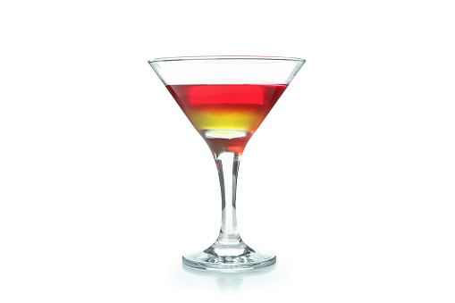 Cosmopolitan martini on white with a lime twist. Clipping path included 