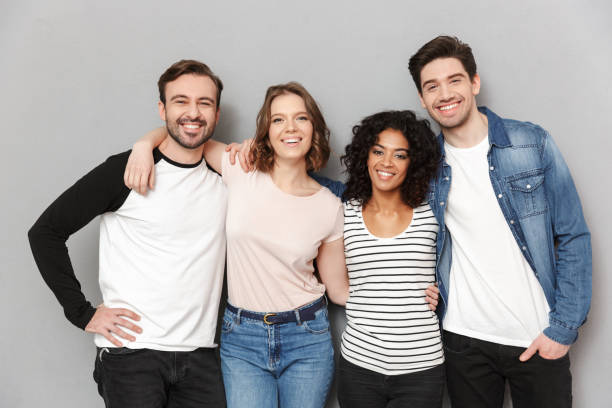 istock Happy group of friends looking camera. 1303884853