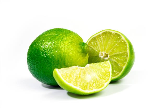 istock Limes Close Up isolated on white background 1303888436