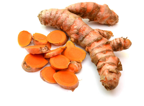 istock Turmeric root nature isolated on white background 1303889489