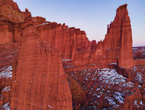 Red Rock Fisher Towers Formations Castle Valley - Beautiful scenic desert landscape lit with warm sunset light in winter. Castle Valley, Moab, Utah USA.